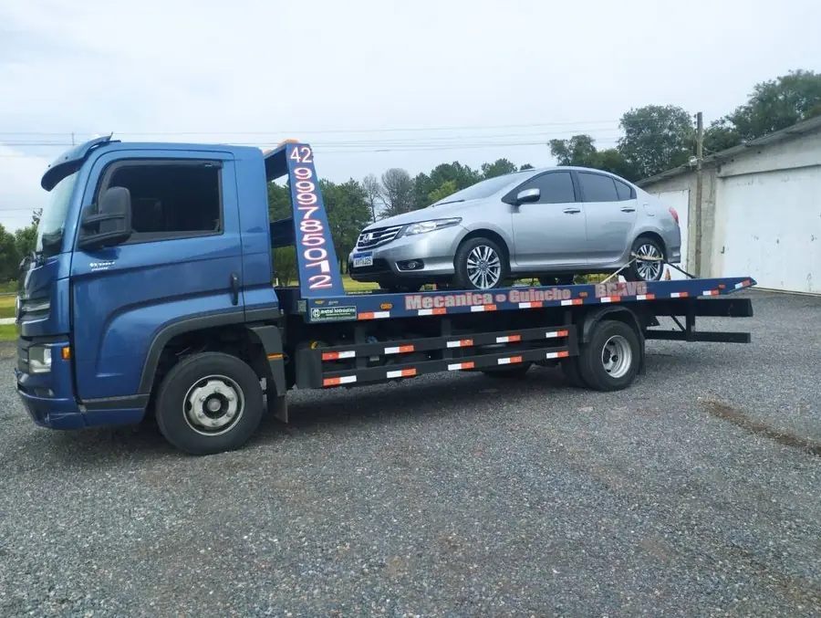 Guincho transportando carro de passeio Honda City em São Luís do Purunã